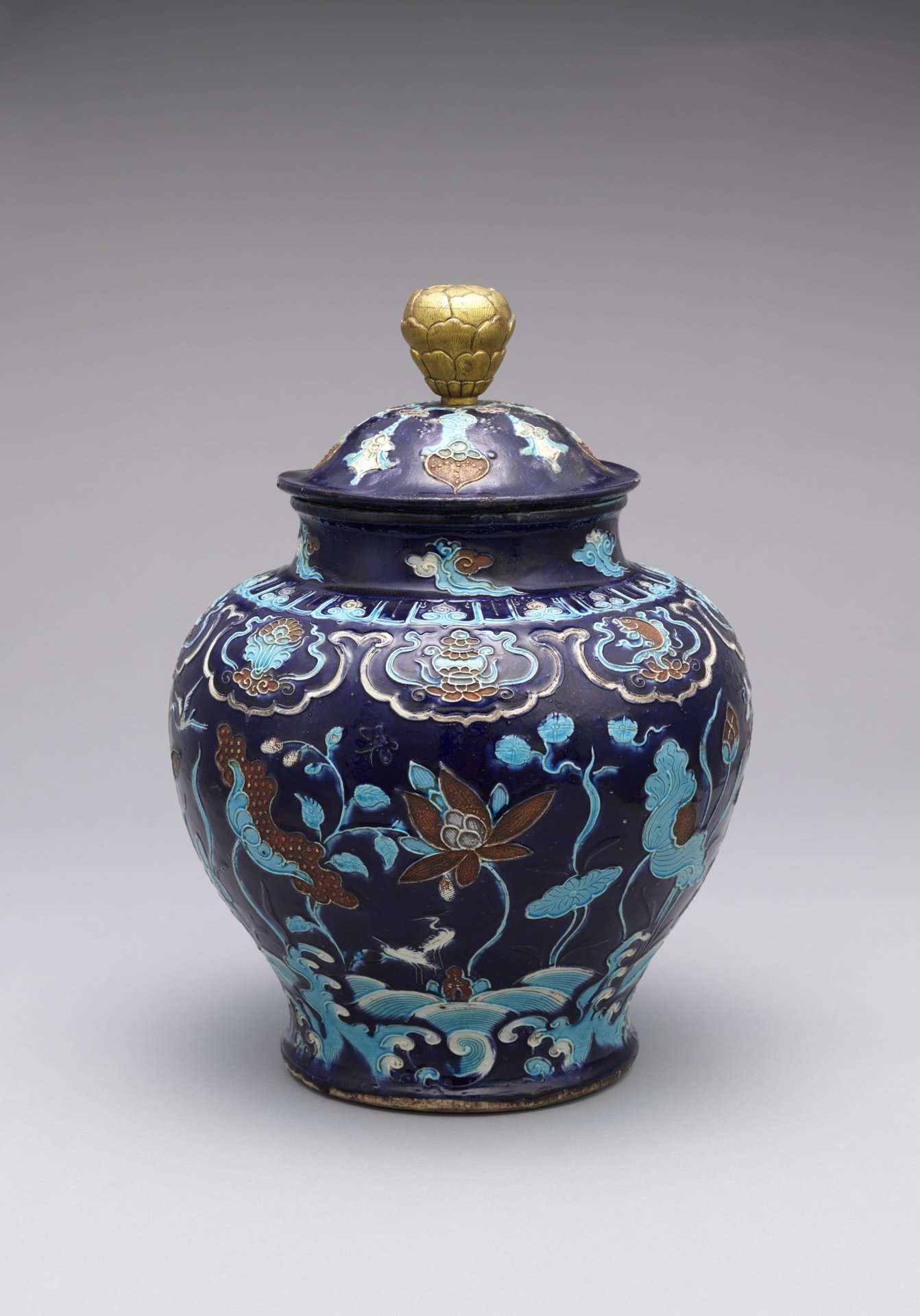Lidded fahua jar with herons and lotuses