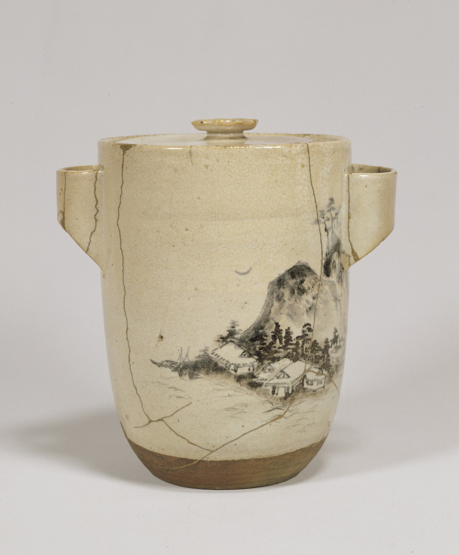 Water jar with a landscape in underglaze iron