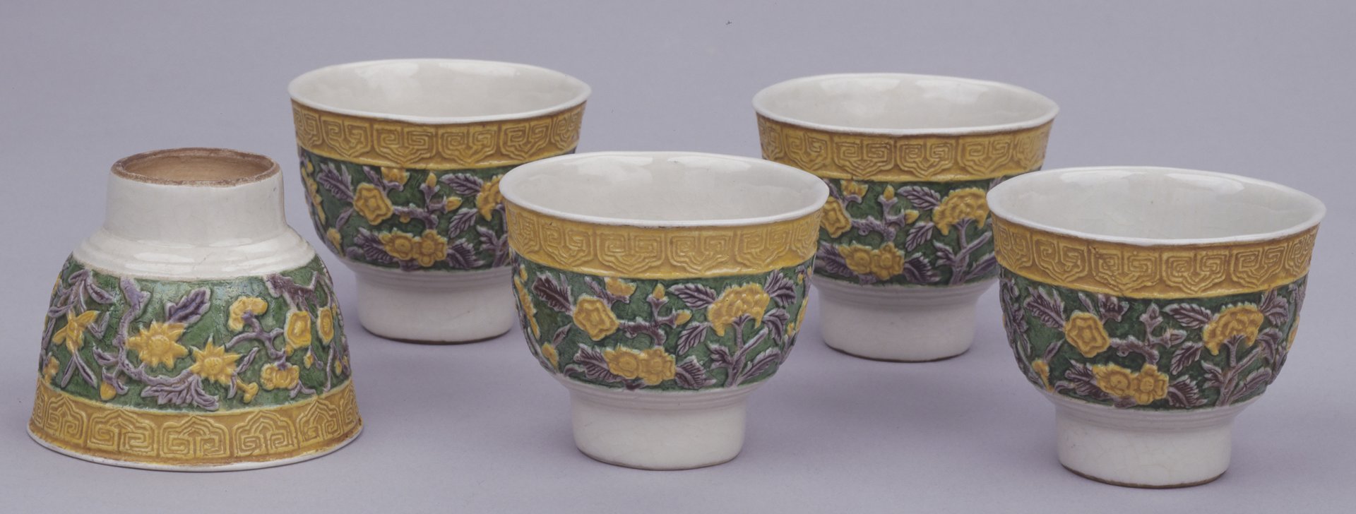 Sencha cups with seven fragrant plants in relief, Cochin-type glaze